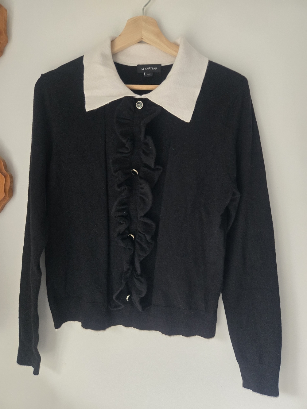 le chateau Black Sweater with White Collar and Ruffle Button Front